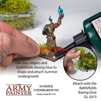 Step-by-step guide on applying summer undergrowth to a miniature figure using The Army Painter products.