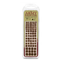 A blister pack of The Army Painter Wasteland Tuft, showing 77 individual grass tufts with a dry, scrubby wasteland colour.