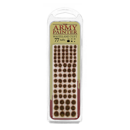 A blister pack of The Army Painter Wasteland Tuft, showing 77 individual grass tufts with a dry, scrubby wasteland colour.