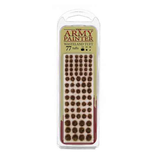 A blister pack of The Army Painter Wasteland Tuft, showing 77 individual grass tufts with a dry, scrubby wasteland colour.