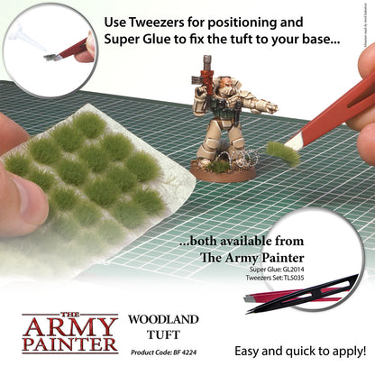 Advertisement for The Army Painter Woodland Tuft with tools and product packaging on a grid background.