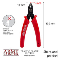 Red plastic frame cutter with dimensions and safety warning on a white background