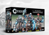 Box art for the Conquest: W'adrhŭn Chosen of War Brute Expansion Set, featuring three massive heavy brute infantry miniatures in fused, metal-plated armor.