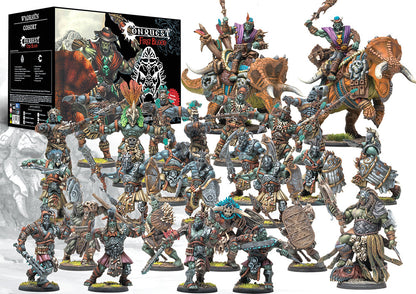 A collection of painted W'adrhŭn miniatures from the Cohort Starter Set, featuring the Predator character, Thunder Riders (dinosaur cavalry), and various Braves and Veterans infantry units.