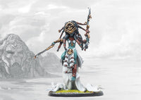 Close-up details of the Scion of Death miniature, highlighting the intricate four-armed design, grotesque tribal mask, and wickedly curved sacrificial blades.