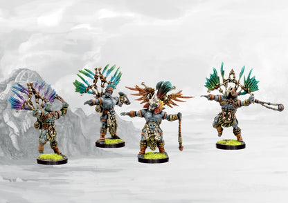Four fully painted W'adrhŭn Slingers miniatures, showcasing the ornate feathered and bone battle standards and light infantry armor.