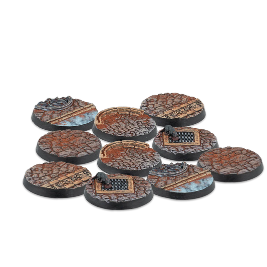 A group shot of the 10 unpainted 30mm Feudom Scenery Bases from the Alpha Series for Warcrow.