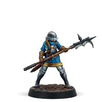 A painted Warcrow miniature of a female Feudom Guisarmier in a defensive pose with a large halberd.