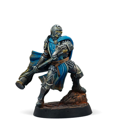 A painted Warcrow miniature of a Feudom Knight of the Sacred Relic, a heavily armoured warrior with a large hammer.