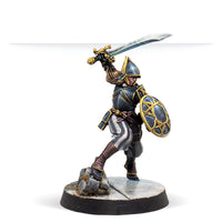 A painted Warcrow miniature of a male Black Legion Bucklerman in a defensive stance with sword and shield.