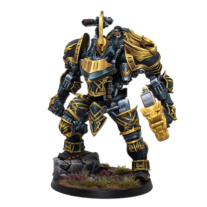 A painted Warcrow miniature of the Hegemony of Embersig War Rig, a large mech in black and gold armour.