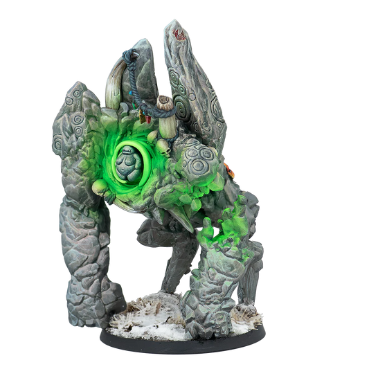 A painted Warcrow miniature of the Northern Tribes Rock Troll, a large stone elemental with a glowing green core.