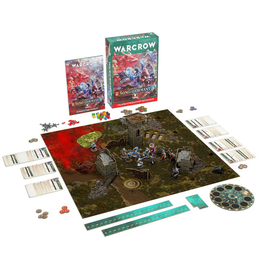 All the contents of the Warcrow: Song of the Dormant battle pack, including 14 miniatures, scenery, game mat, dice, and tokens.