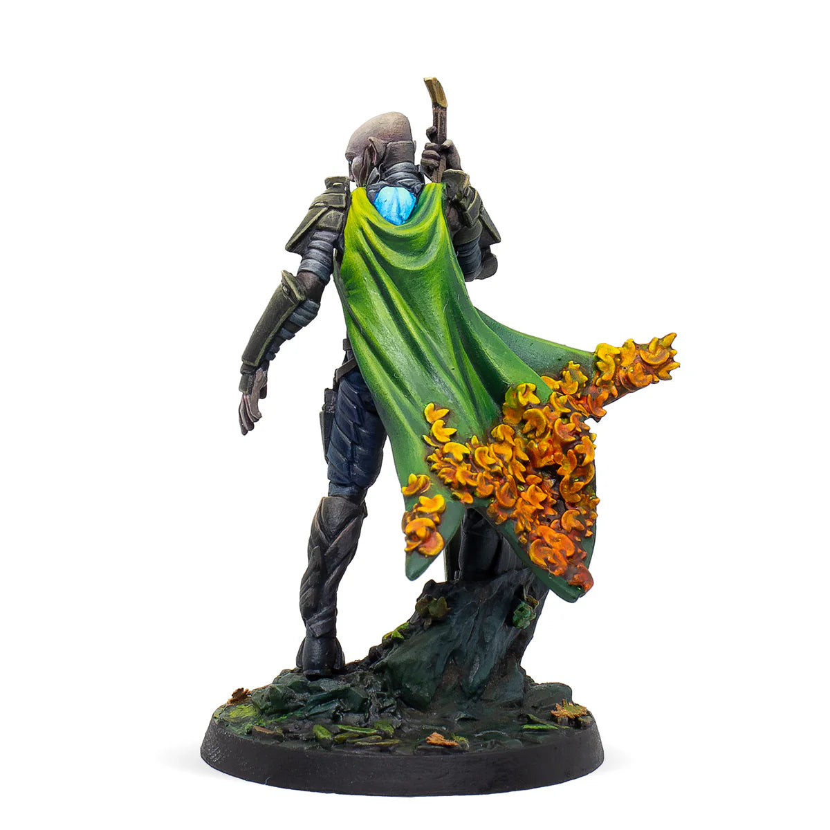 A rear view of the painted Neakail Oen Fhiahra miniature, showcasing his green cape adorned with autumn leaves.