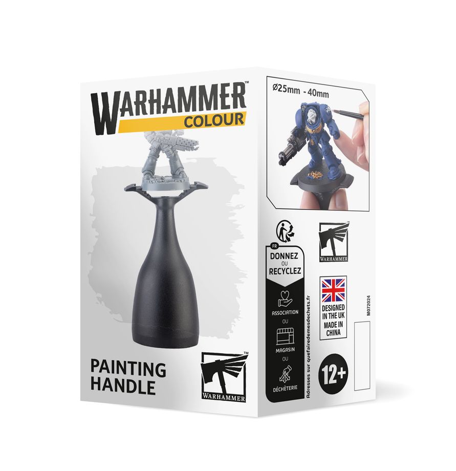The official retail product box for the Warhammer Colour Painting Handle, displaying the ergonomic hobby tool.